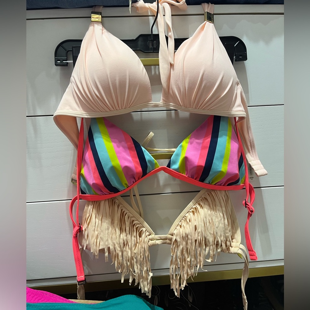 Lot of bikini tops. Striped is large but fits like medium